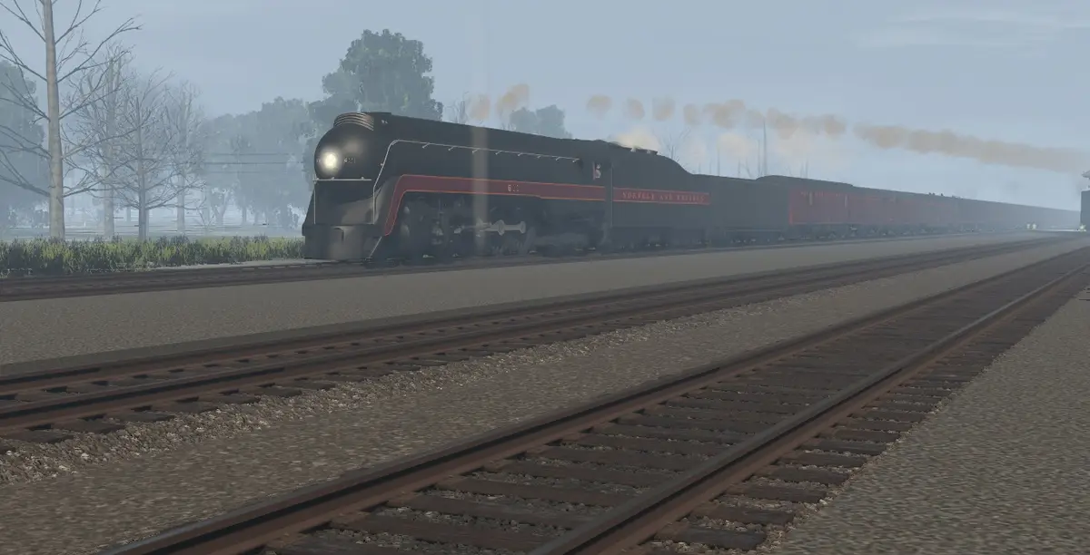 A steam locomotive with 'NORFOLK AND WESTERN' written on its side is shown moving along train tracks through a misty, rural…