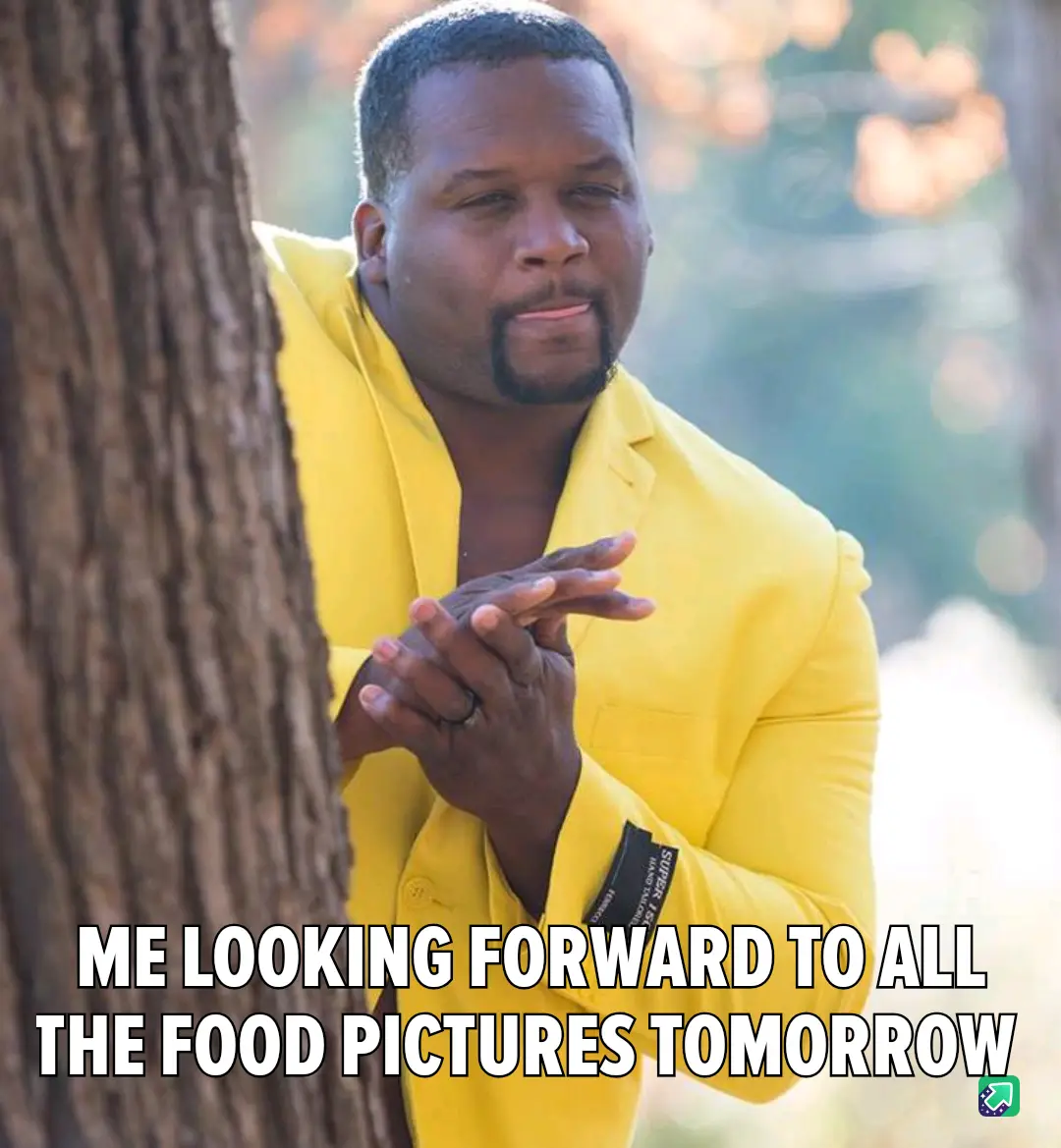 A man in a bright yellow blazer peeks around a tree trunk with a hopeful, anticipatory expression, hands clasped together…