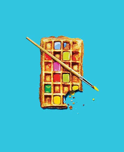 A golden-brown waffle is shown against a bright blue background, with a paintbrush diagonally resting across it. The…
