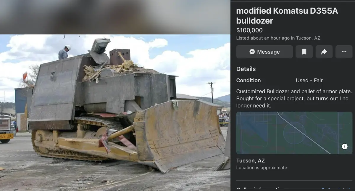 A heavily modified Komatsu D355A bulldozer, appearing armored and cluttered with scrap metal, is listed for $100,000 on a…