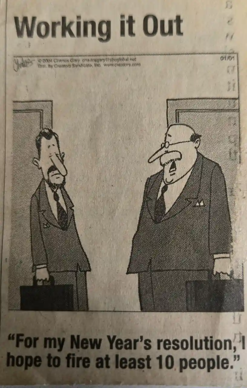 A black-and-white newspaper comic strip titled 'Working it Out' shows two men in suits standing in an office doorway. The…