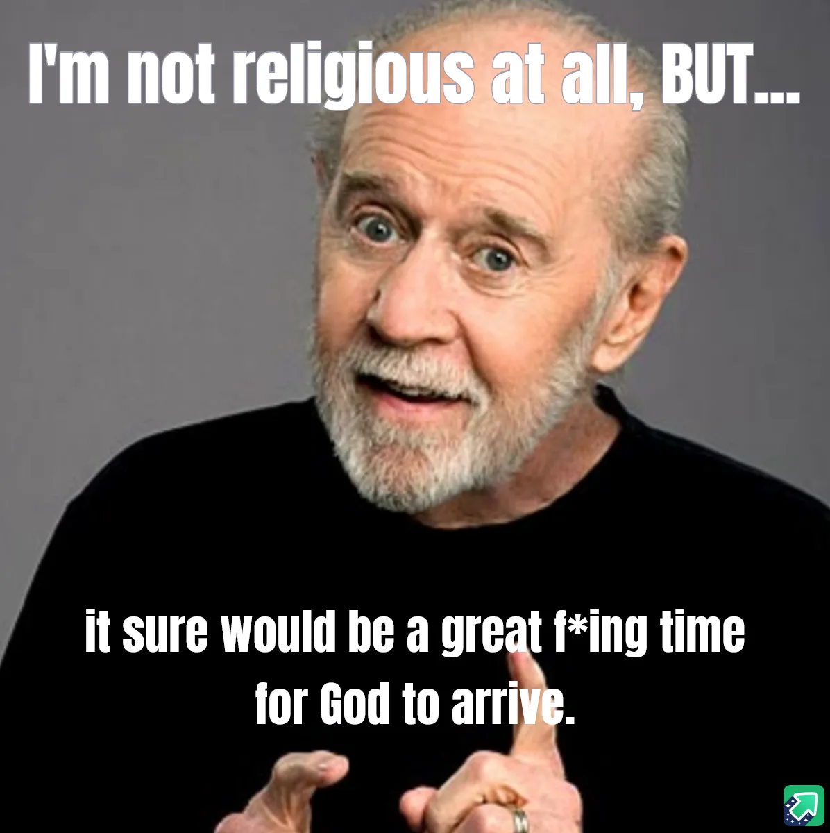 An older man with a white beard and blue eyes, wearing a black shirt, looks surprised and points with both index fingers…