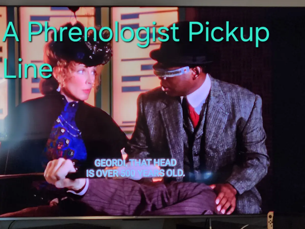 A still from Star Trek: The Next Generation shows Geordi La Forge wearing his VISOR, examining a woman's head while she…