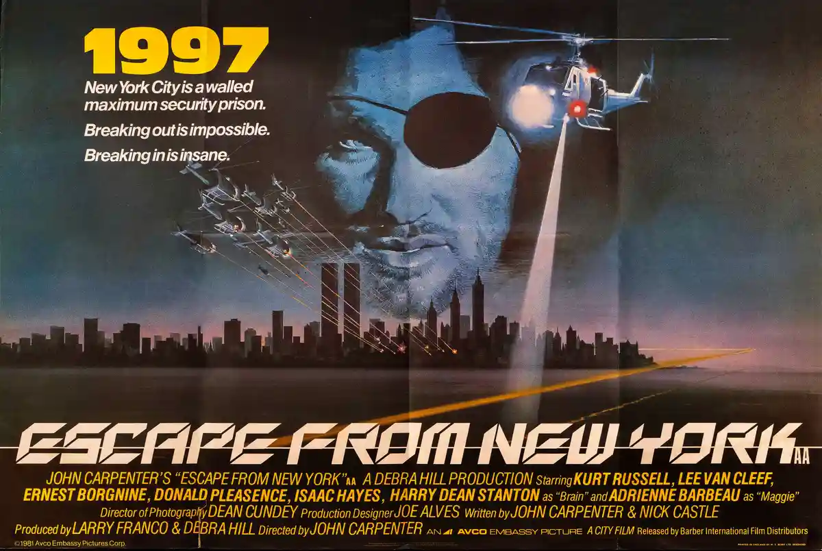 This is a movie poster for 'Escape from New York' (1981), featuring a large blue-tinted face of a man with an eyepatch…