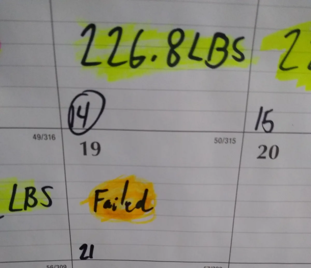 A close-up of a handwritten weightlifting log on lined paper, showing a weight of '226.8LBS' highlighted in yellow. Below…