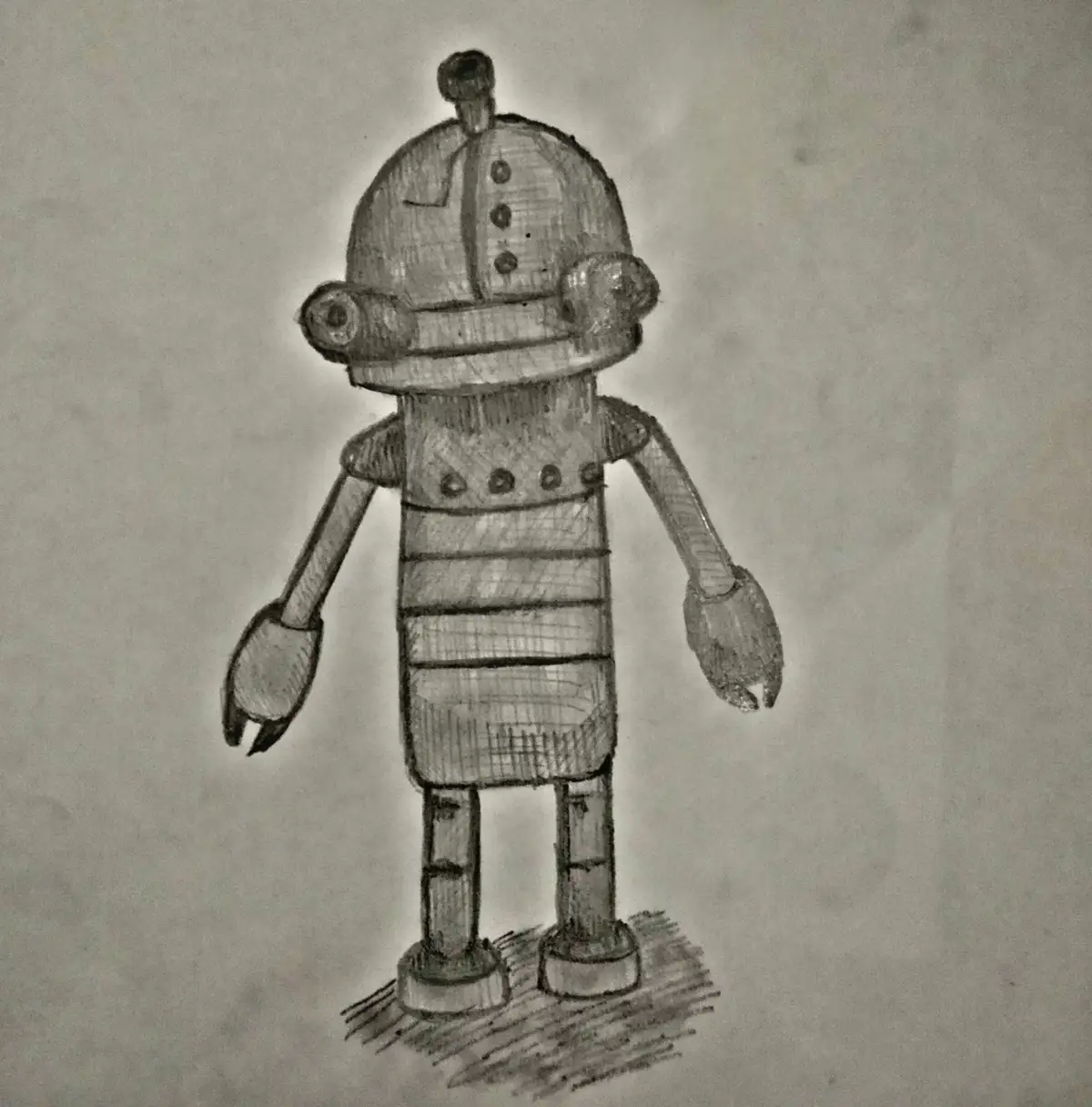 A hand-drawn, pencil sketch of a simple, boxy robot with a dome head, two round eyes, three buttons on its chest, and…