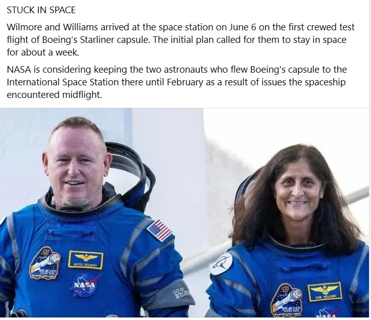 Two smiling astronauts, identified by name tags as Butch Wilmore and Suni Williams, are shown in blue NASA spacesuits with…