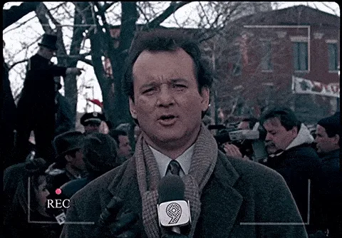 A still from the movie 'Groundhog Day' shows actor Bill Murray as a weatherman repeating his line 'WELL, IT'S GROUNDHOG…