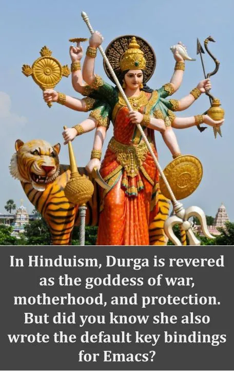 A large statue of the Hindu goddess Durga with multiple arms holding various weapons and symbols, standing beside a tiger…