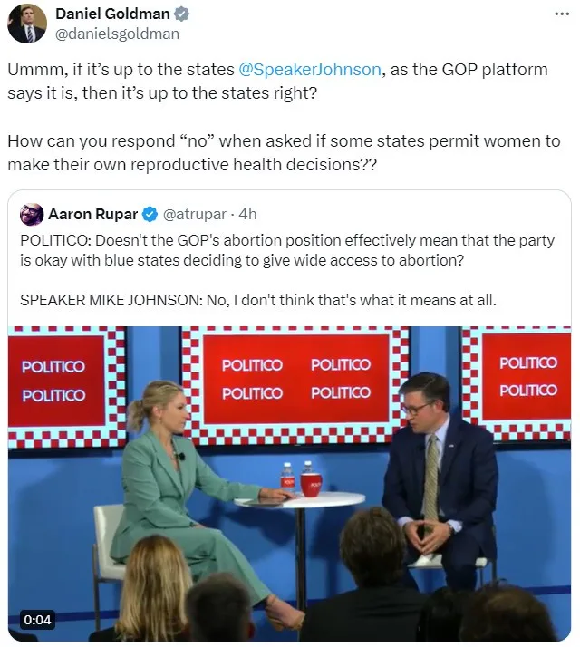A screenshot from a Politico interview shows Speaker Mike Johnson seated across from a female interviewer at a small table…