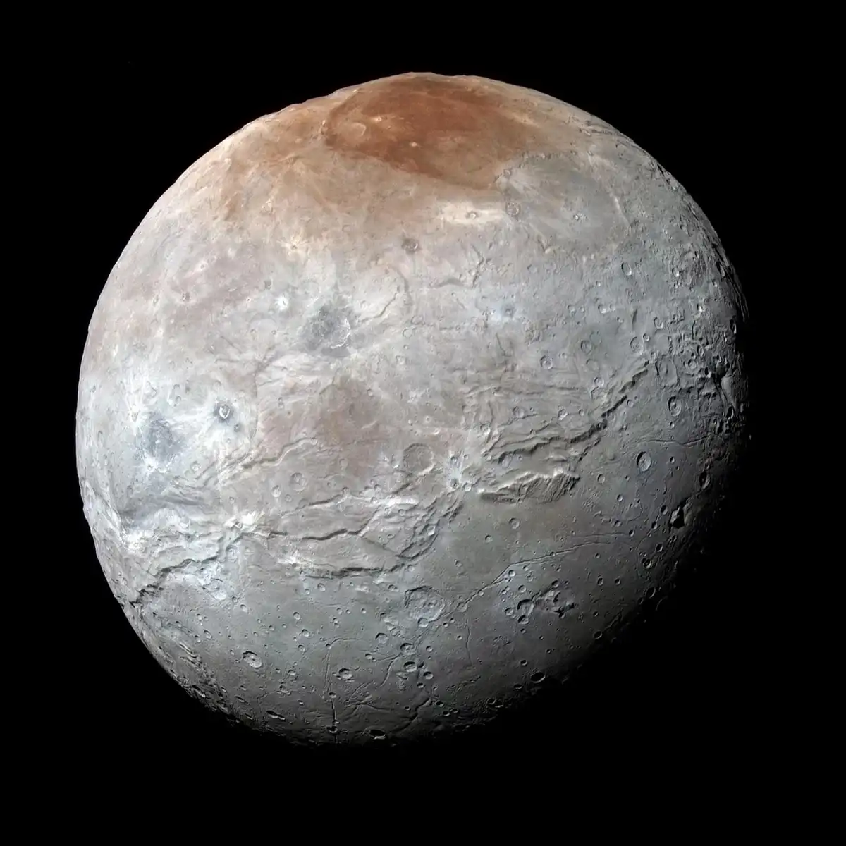 A high-resolution image of the dwarf planet Pluto, showing its varied surface with craters, icy plains, and a distinct…