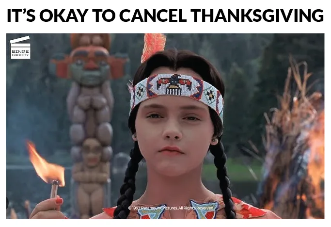 A still image of a young Native American girl from the 1993 film 'The Last of the Mohicans,' holding a lit match, with a…