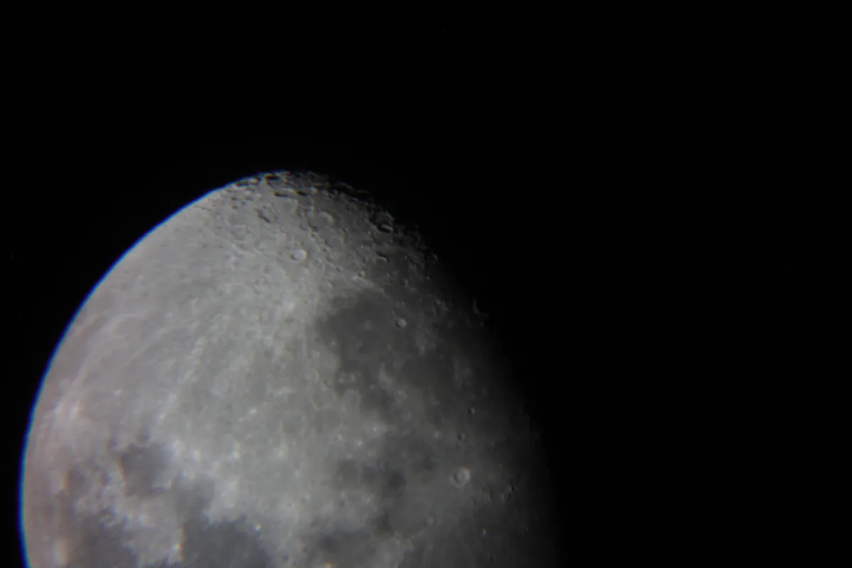 A close-up photograph of the moon's cratered surface against a black sky, with the text 'i'm not crying, you're crying'…