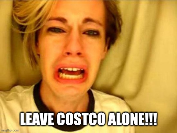 A close-up image of a woman with short blonde hair, visibly distressed, crying with her mouth open in an expression of…