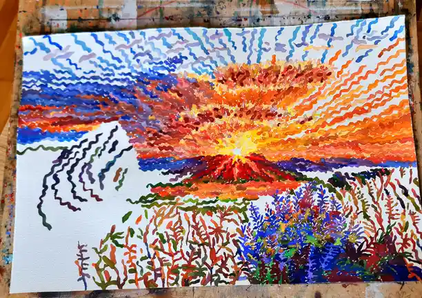 A watercolor painting on white paper depicts a stylized sunset with wavy, abstract brushstrokes in orange, red, and blue…