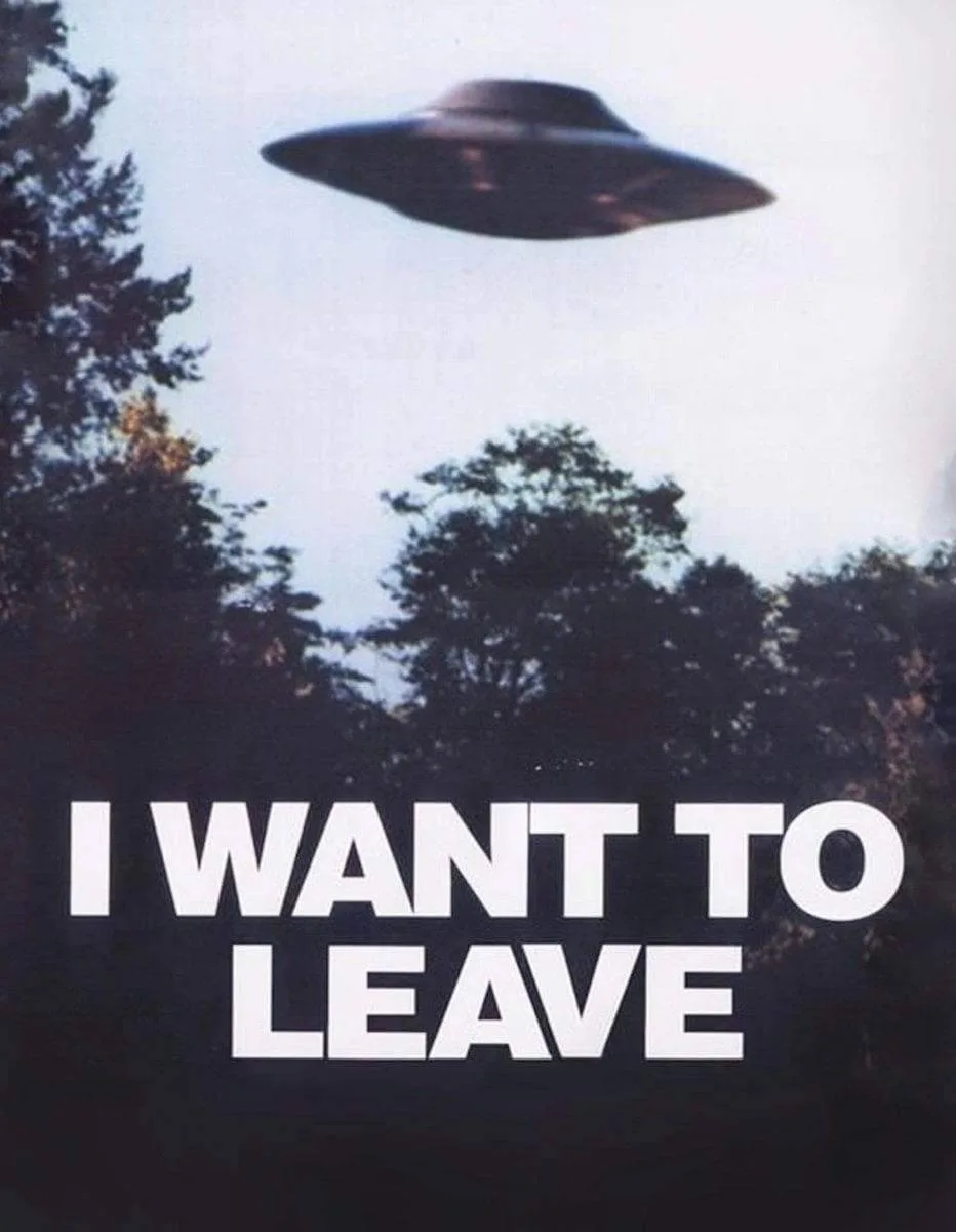 A blurry, vintage-style photograph shows a classic flying saucer hovering in the sky above a line of dark trees. Large, bold…