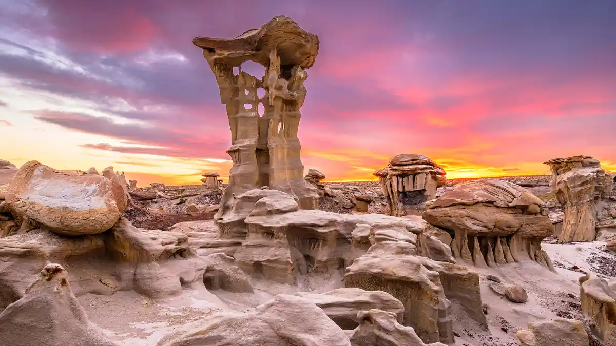 In the Valley of Dreams, the Alien Throne stands tall over Southwestern badlands. This eerie formation, shaped by natural…