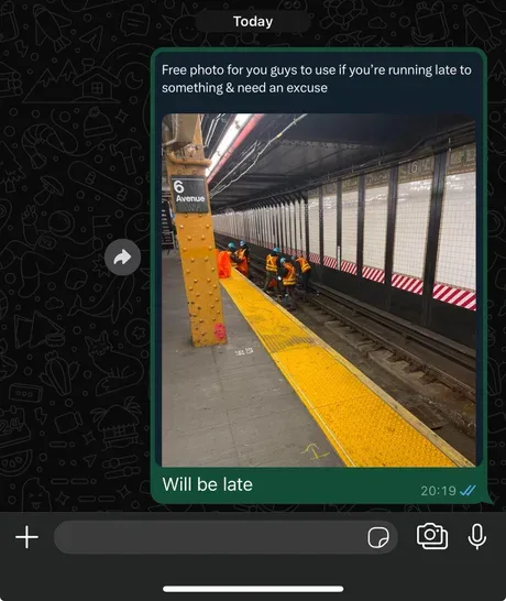 A screenshot of a social media message shows a photo of subway workers in orange vests and hard hats repairing a train…