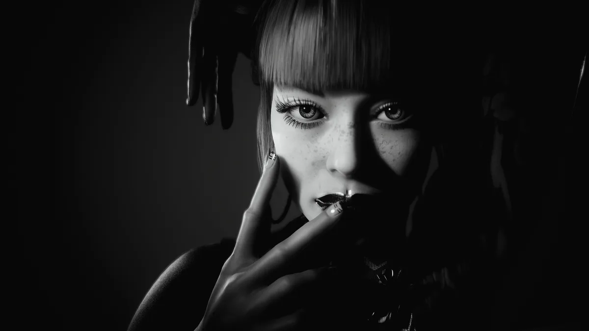 A black-and-white image shows a woman with bangs and freckles, her face partially in shadow, holding a cigarette to her lips…