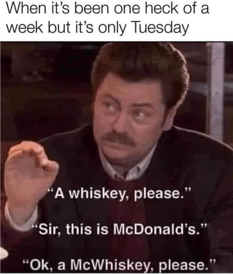 A man with a mustache in a dark suit and red tie looks exasperated while gesturing with his right hand. Overlaid text reads…