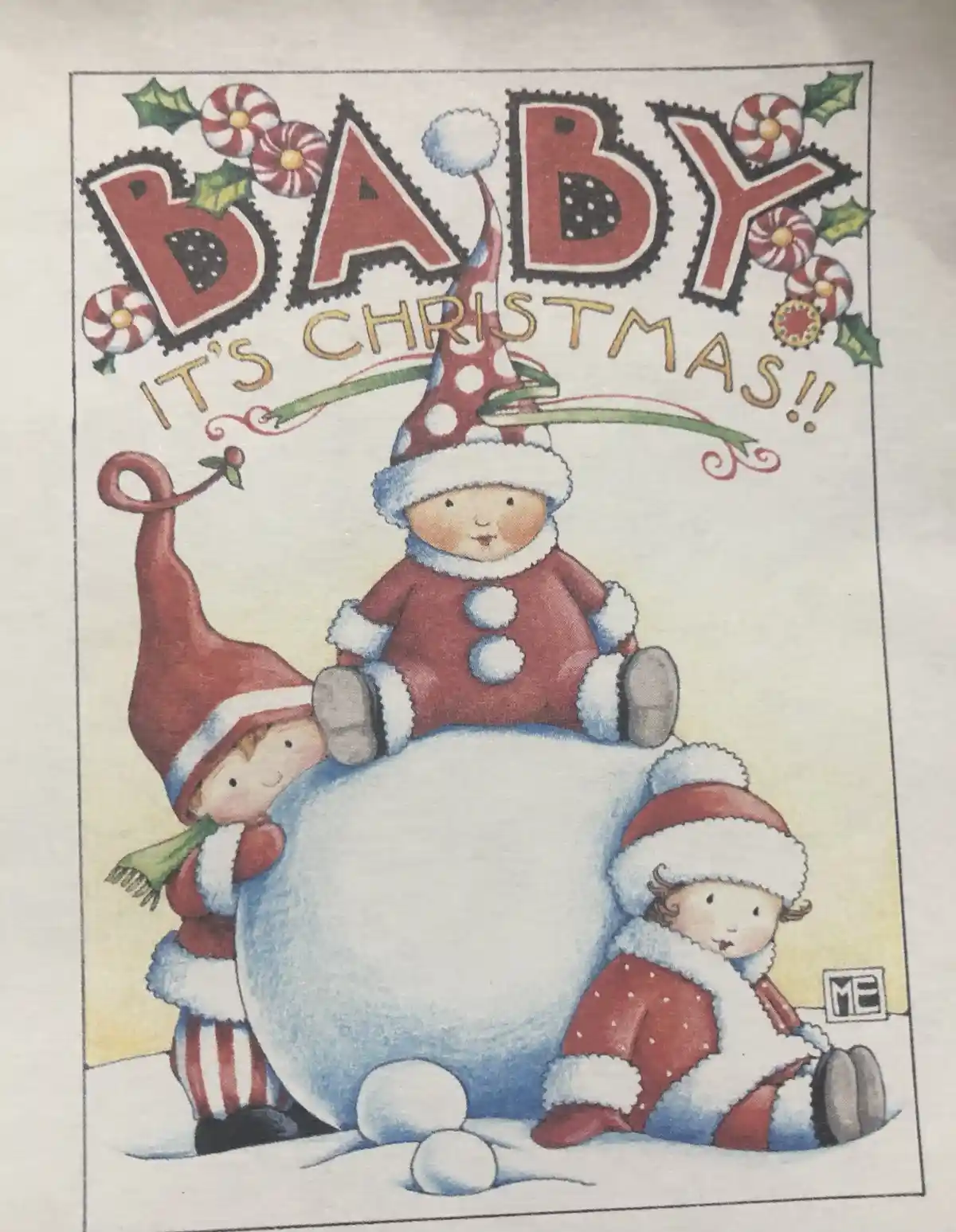 A vintage-style Christmas card illustration shows three baby dolls dressed in festive red and white winter outfits with…