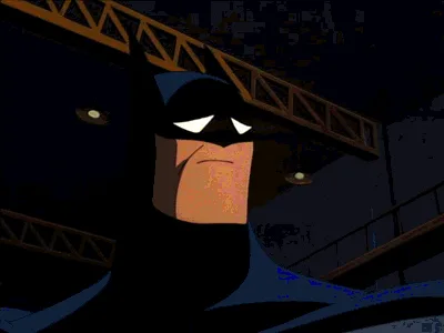 A six-panel animated sequence shows Batman in a dark industrial setting, his expression shifting from stern to increasingly…