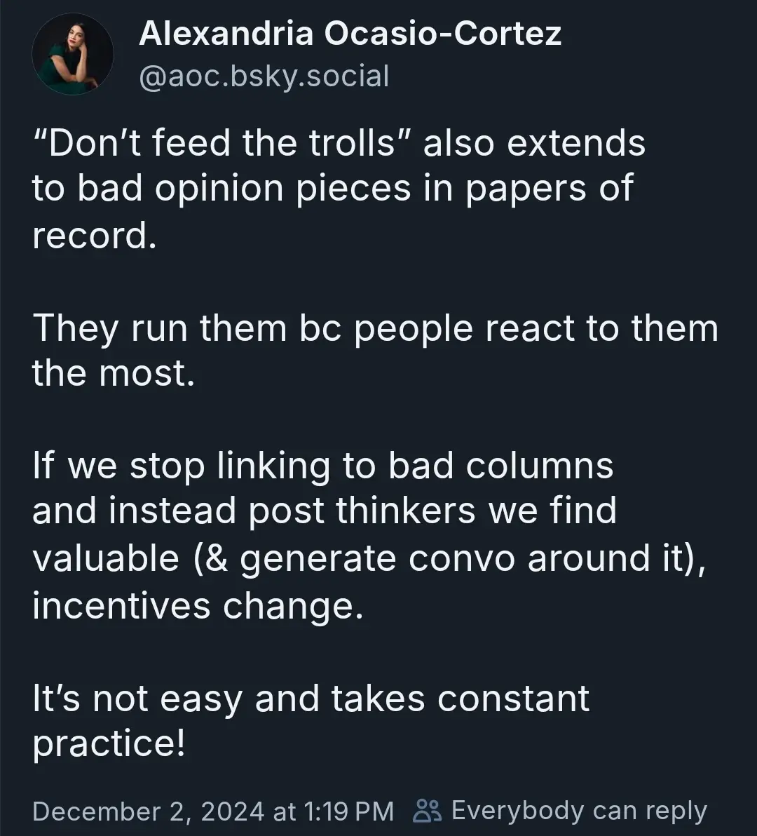 A screenshot of a social media post by Alexandria Ocasio-Cortez on the platform Bluesky, dated December 2, 2024. The post…