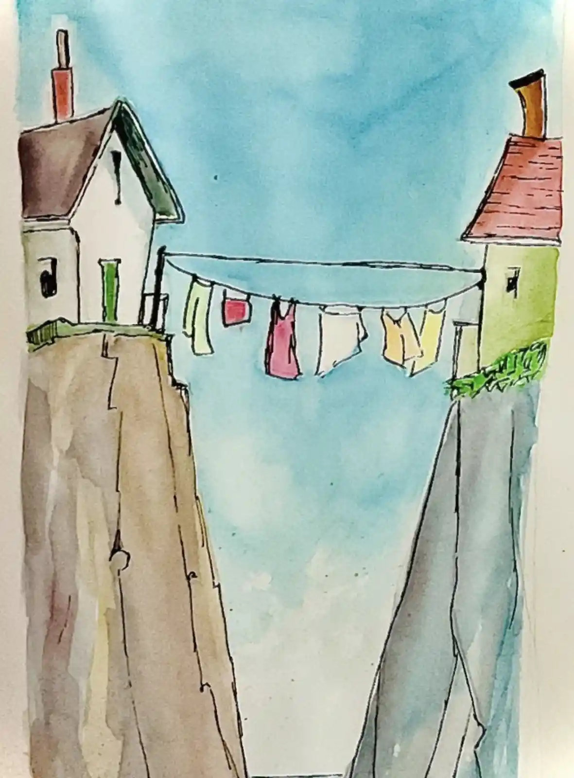 A watercolor illustration shows two houses perched on the edges of steep cliffs, with a clothesline strung between them…