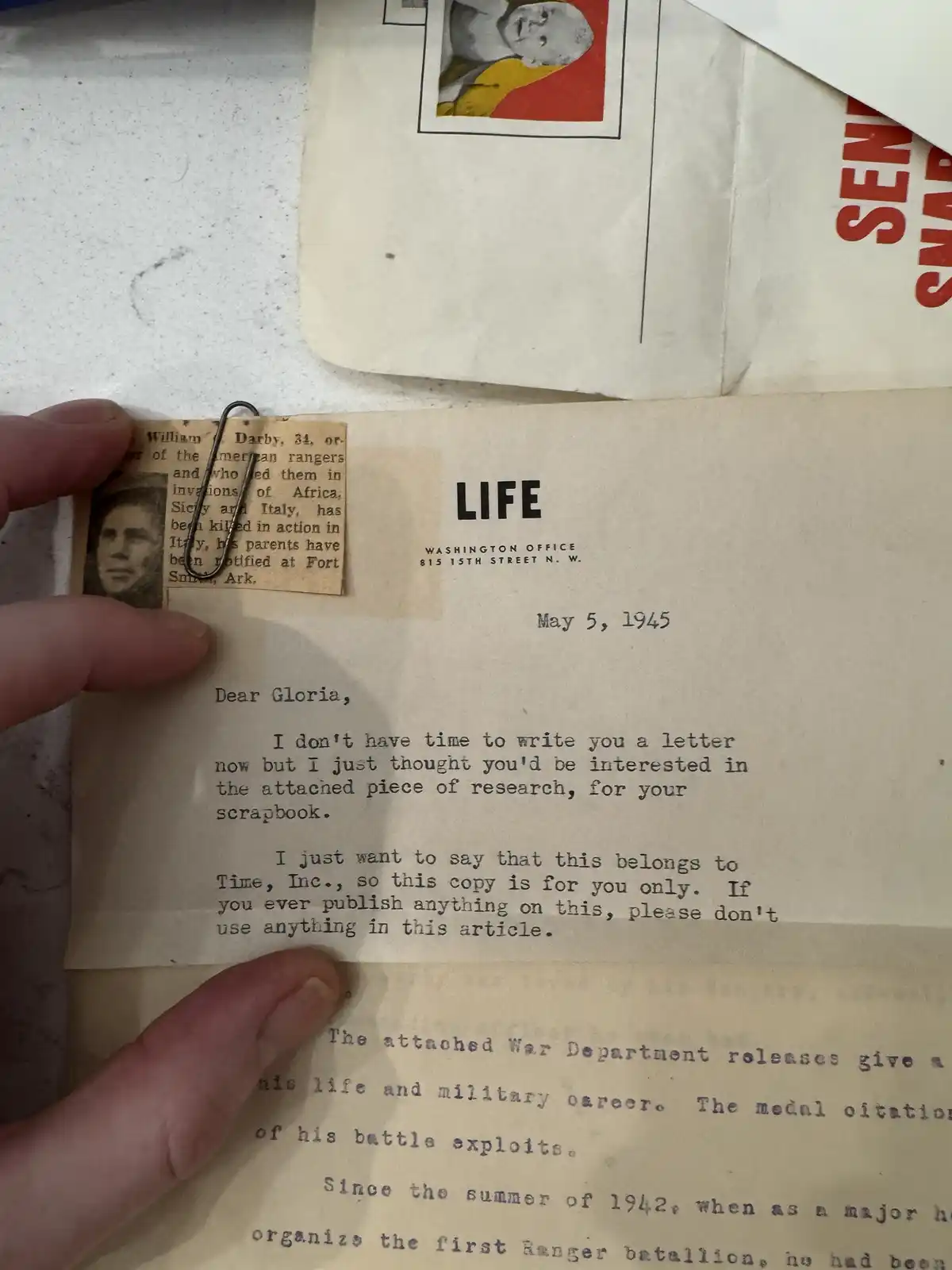 A hand holds a 1945 letter from LIFE magazine dated May 5, 1945, addressed to Gloria. The letter, typed on official LIFE…