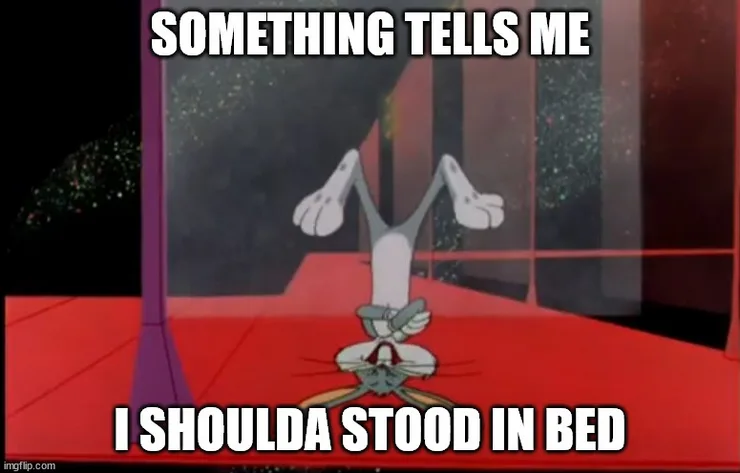 A cartoon rabbit is shown upside down with its legs in the air, appearing to be stuck or falling. The image has white text…