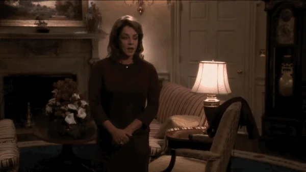 A still from the movie 'The American President' shows a woman apologizing for being wrong, while a man in a suit responds…