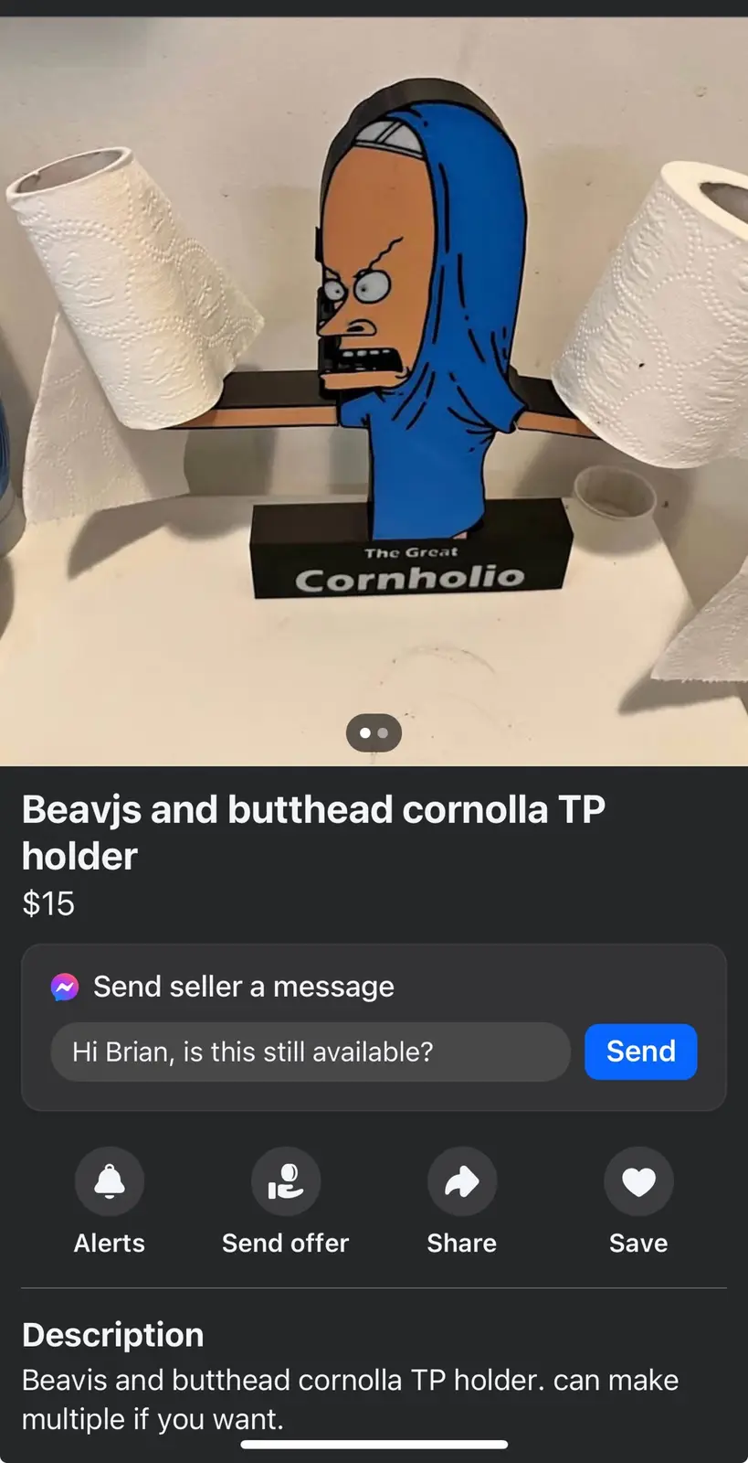 A Beavis and Butthead-themed toilet paper holder, shaped like the character Cornholio with a blue hood, holds two rolls of…