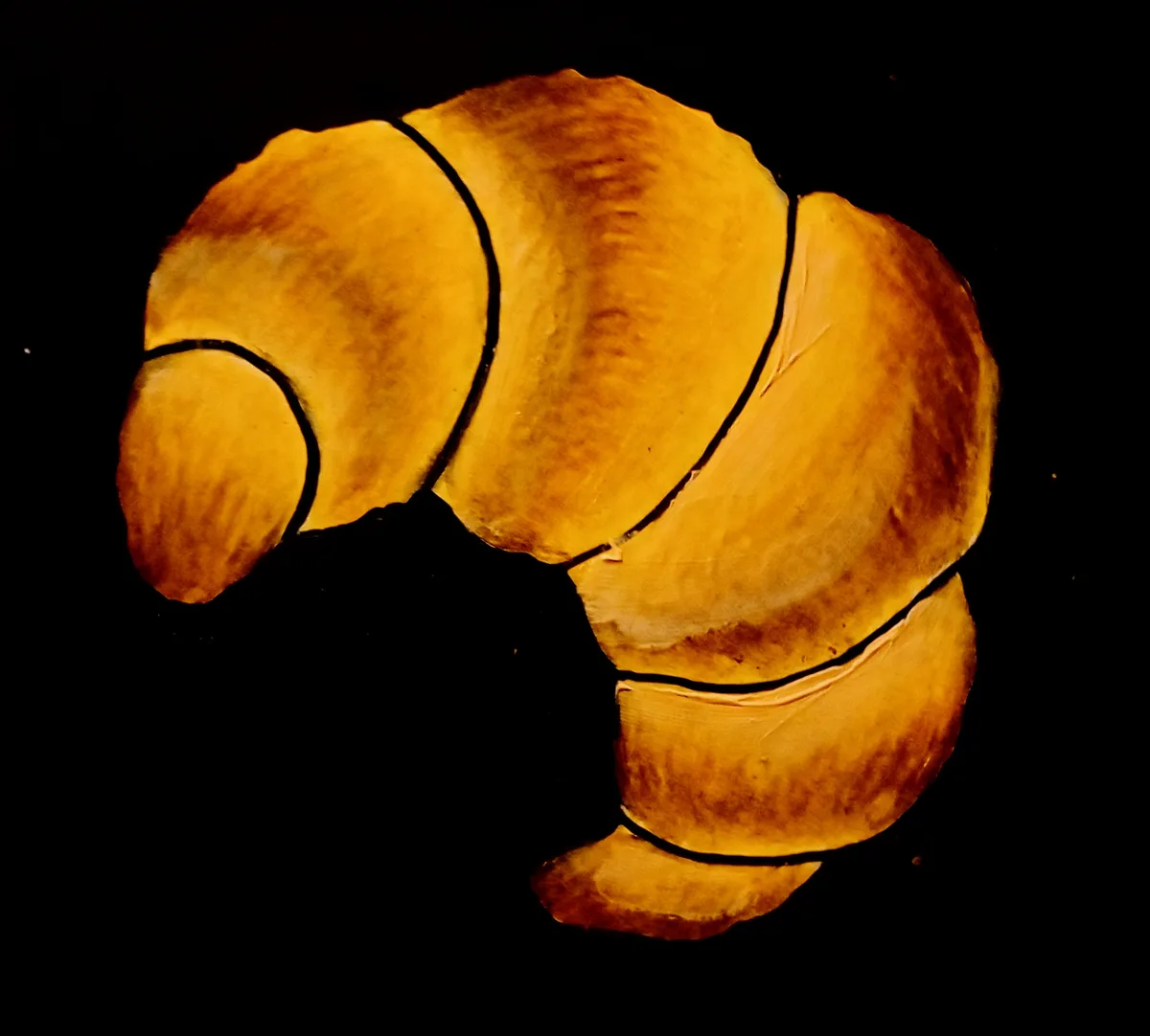 A close-up image shows a golden-brown croissant against a black background, with bold black outlines defining its flaky…
