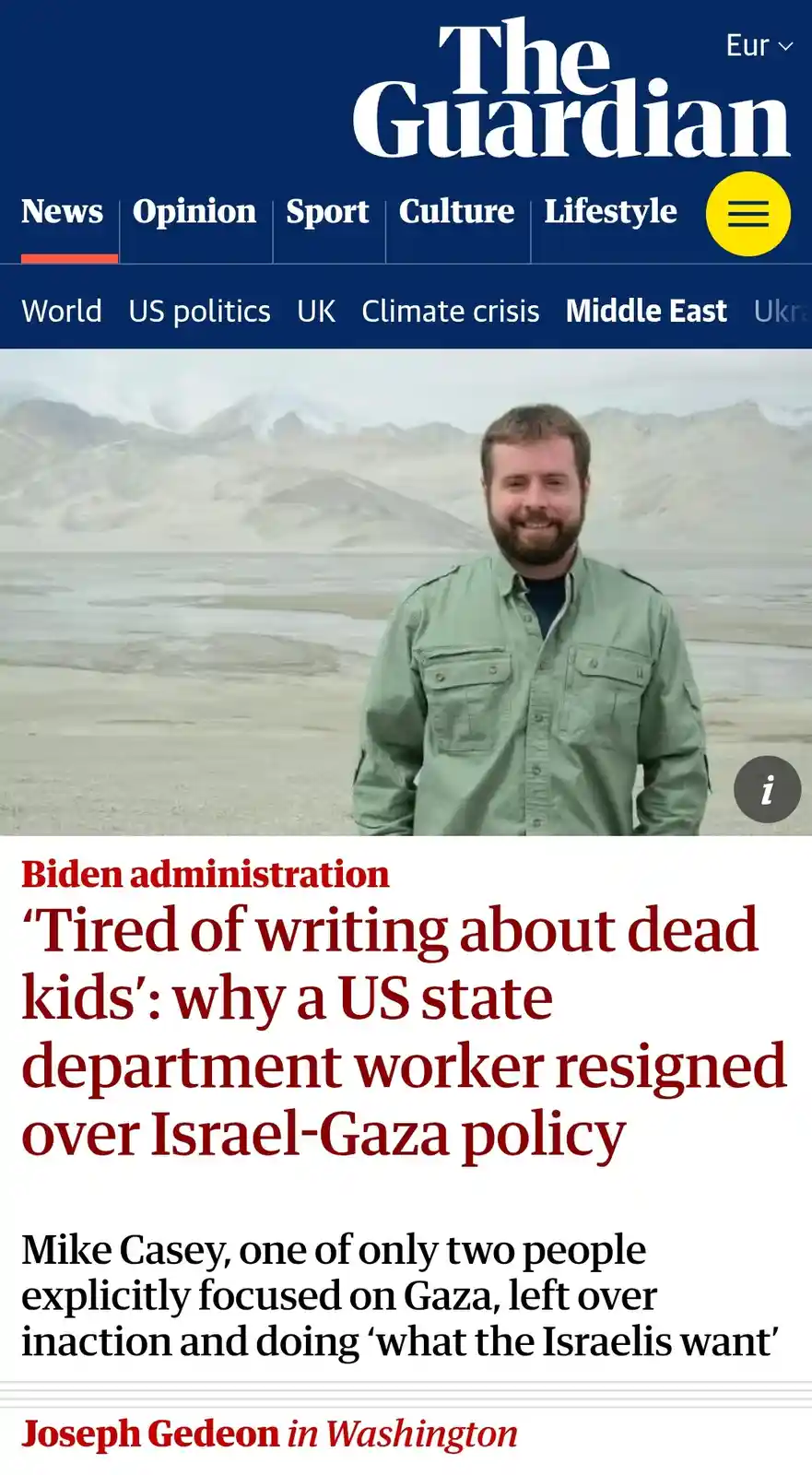 The image is a screenshot of a The Guardian news article featuring a smiling man in a green shirt standing in front of a…