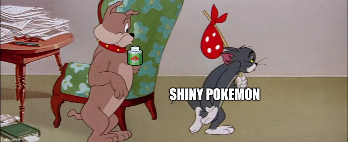 In a classic Tom and Jerry cartoon scene, Tom the cat, holding a red Poké Ball with a white dot, walks with a dejected…
