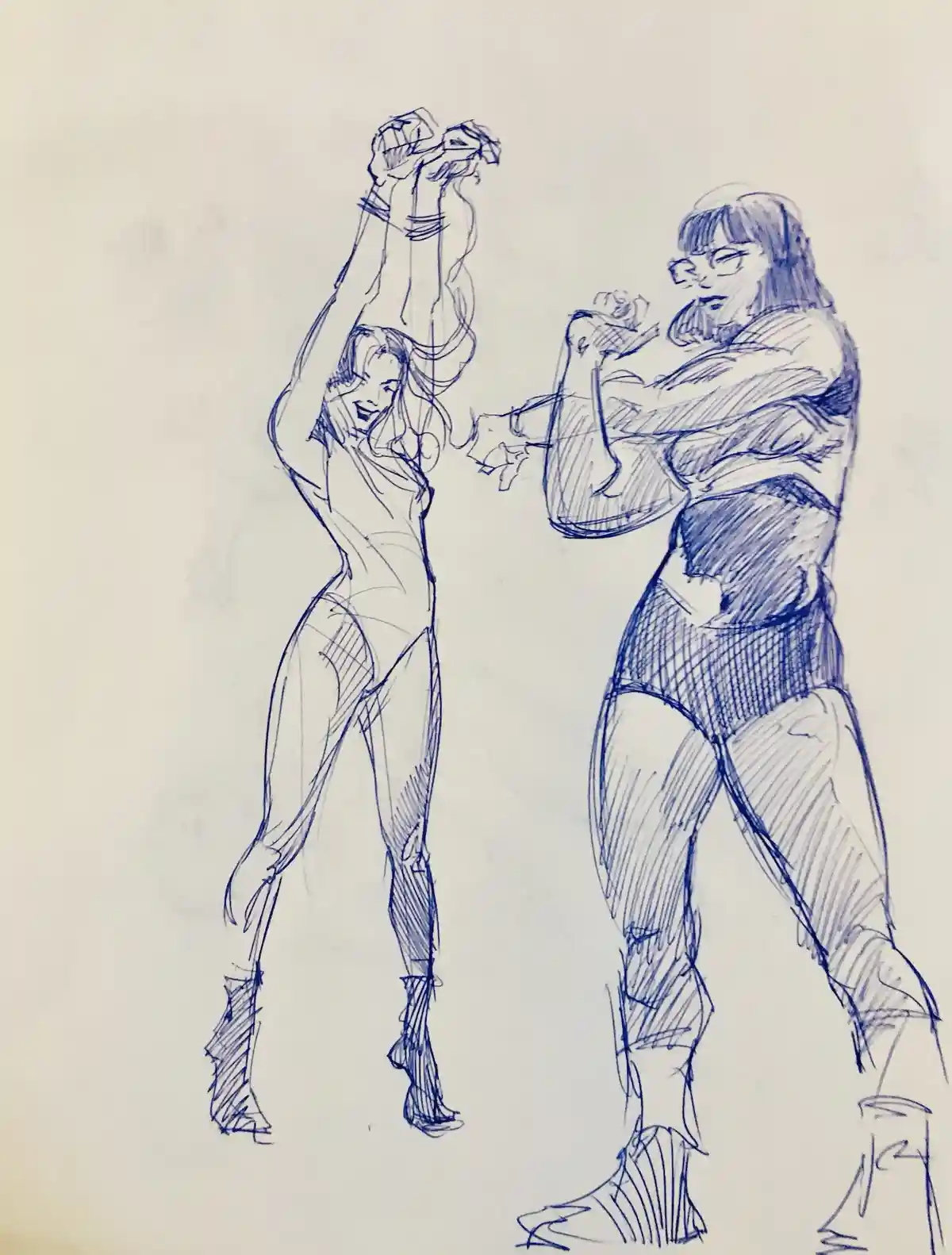 A blue ink sketch shows two female characters in dynamic poses. The character on the left, with long hair and a joyful…
