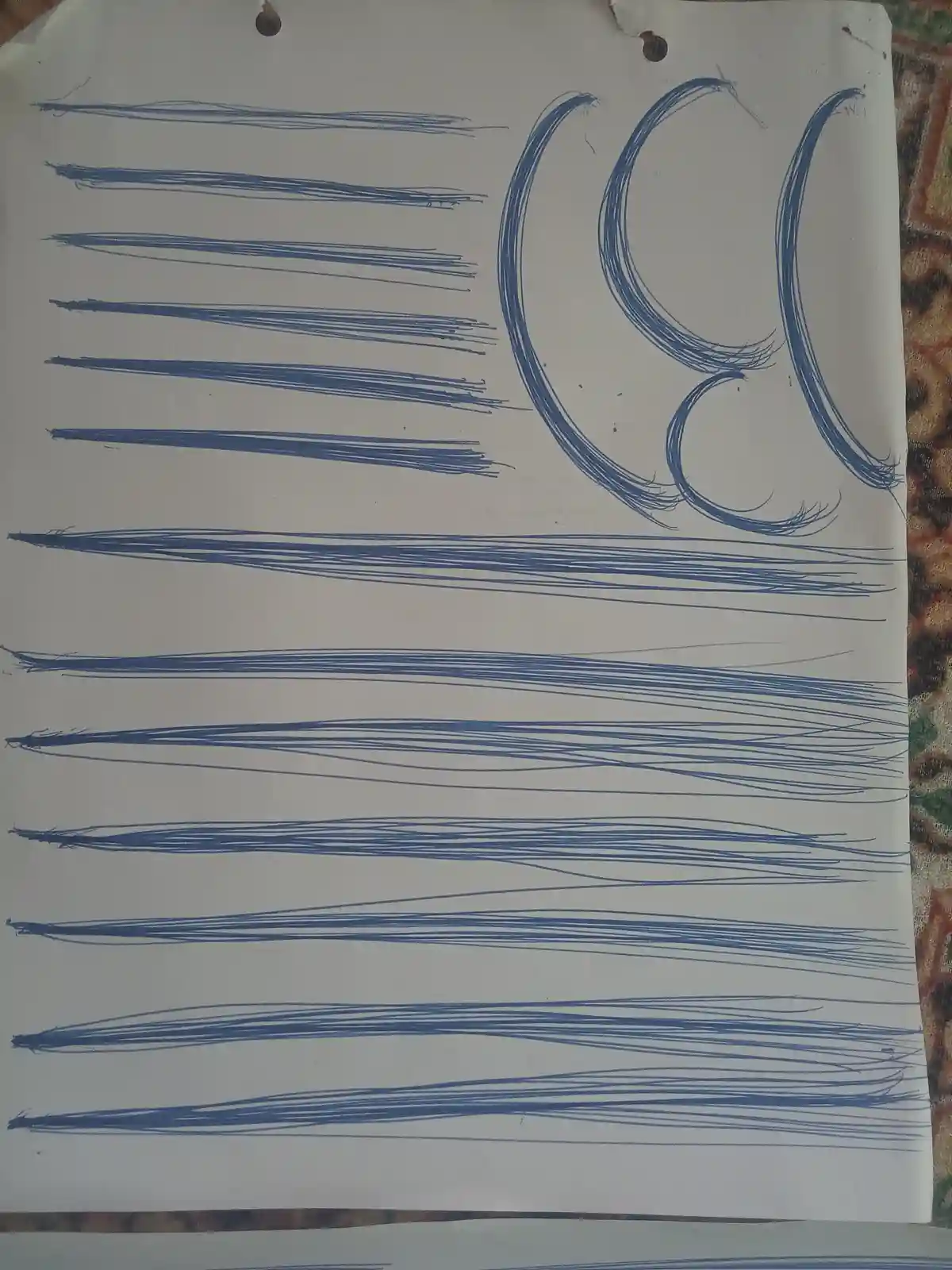 A piece of white paper with blue ink drawings shows the word 'so' written in large, thick, stylized letters on the right…