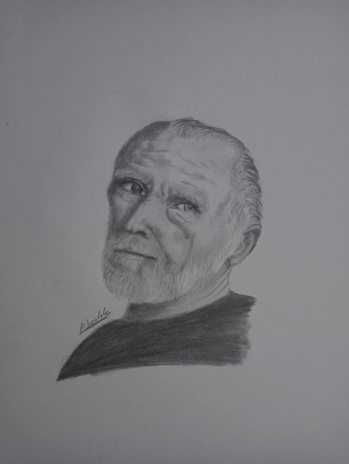 A detailed pencil sketch of an older man with a receding hairline, a gray beard, and a serious expression, wearing a dark…
