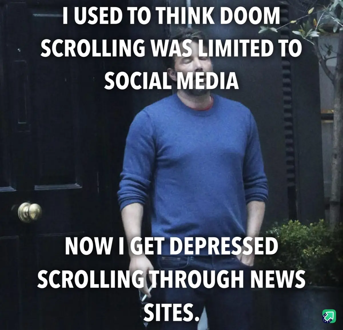 A man in a blue sweater stands in front of a dark door with a weary, resigned expression. White text overlaid in two…