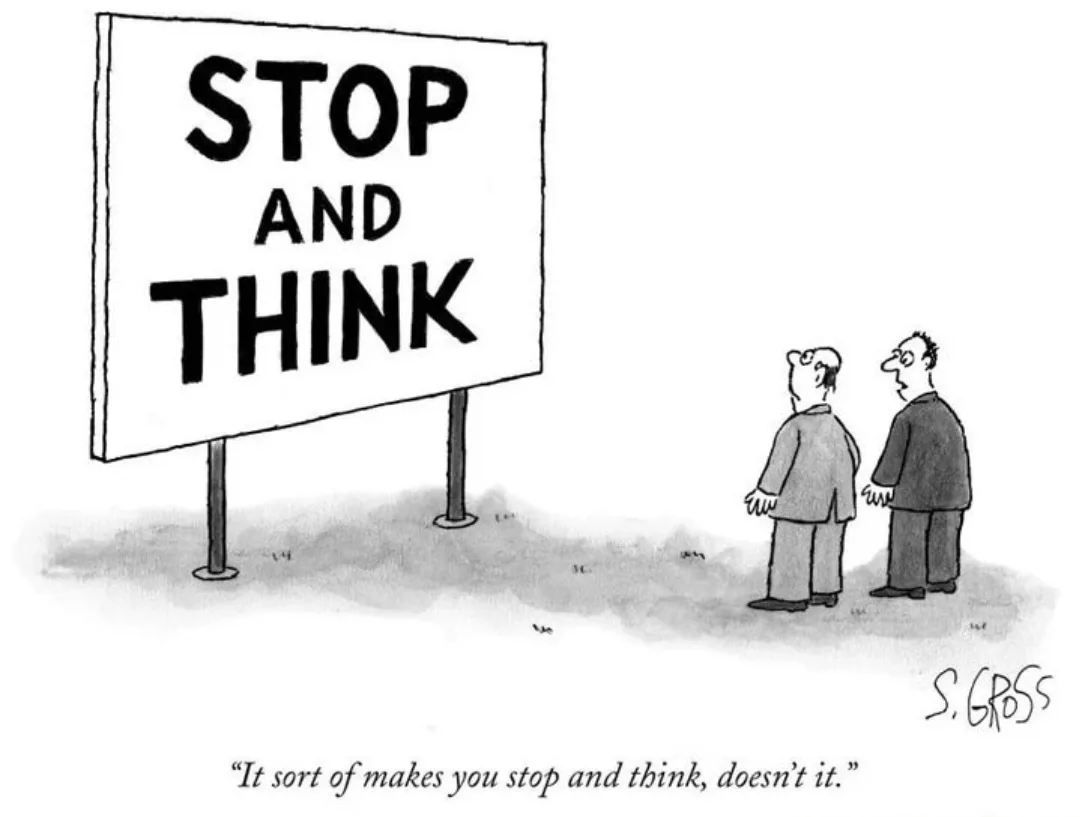 Two men stand facing a large roadside sign that reads 'STOP AND THINK'. The men appear to be staring at the sign. Below the…