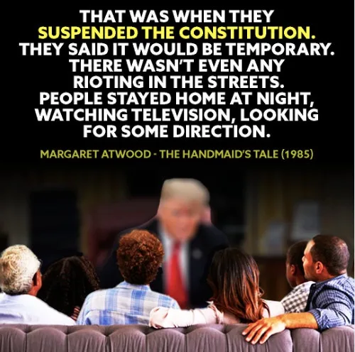 The image shows a group of diverse people sitting on a couch, watching a blurred figure on a screen in front of them. The…
