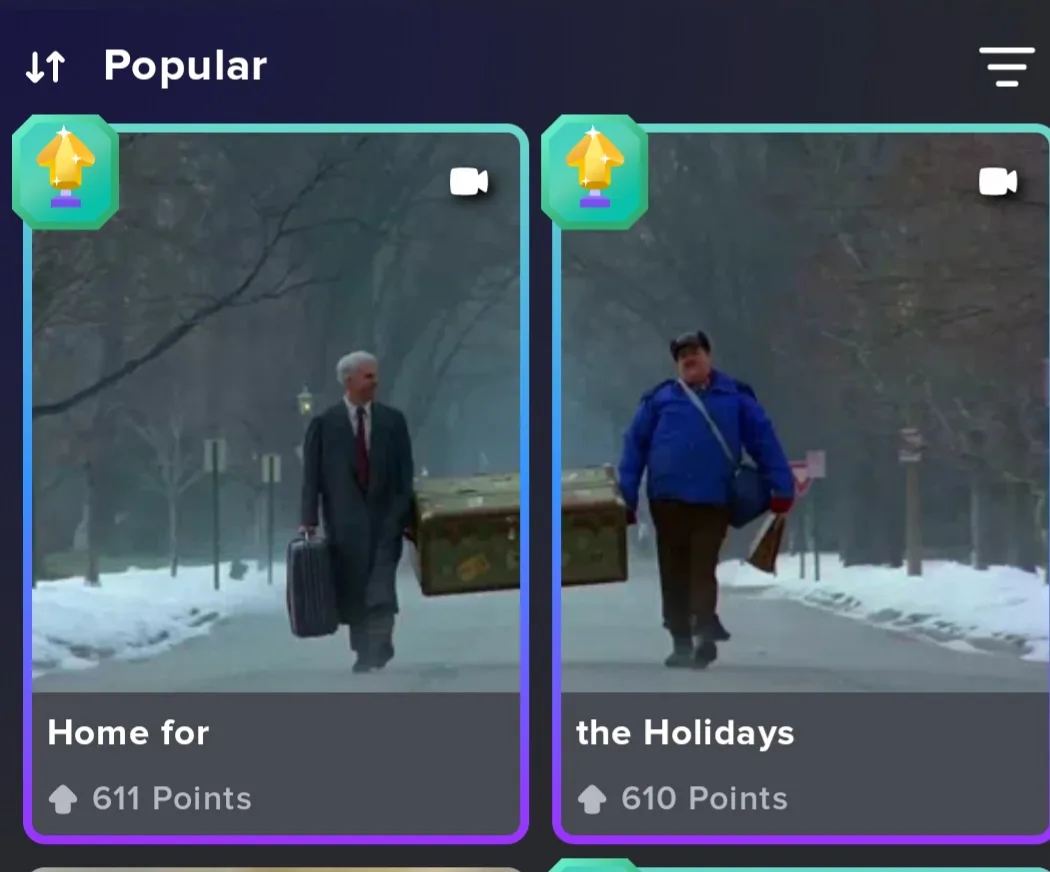 Two side-by-side video thumbnails show a man in a suit carrying a suitcase and a trunk, and another man in a blue jacket…