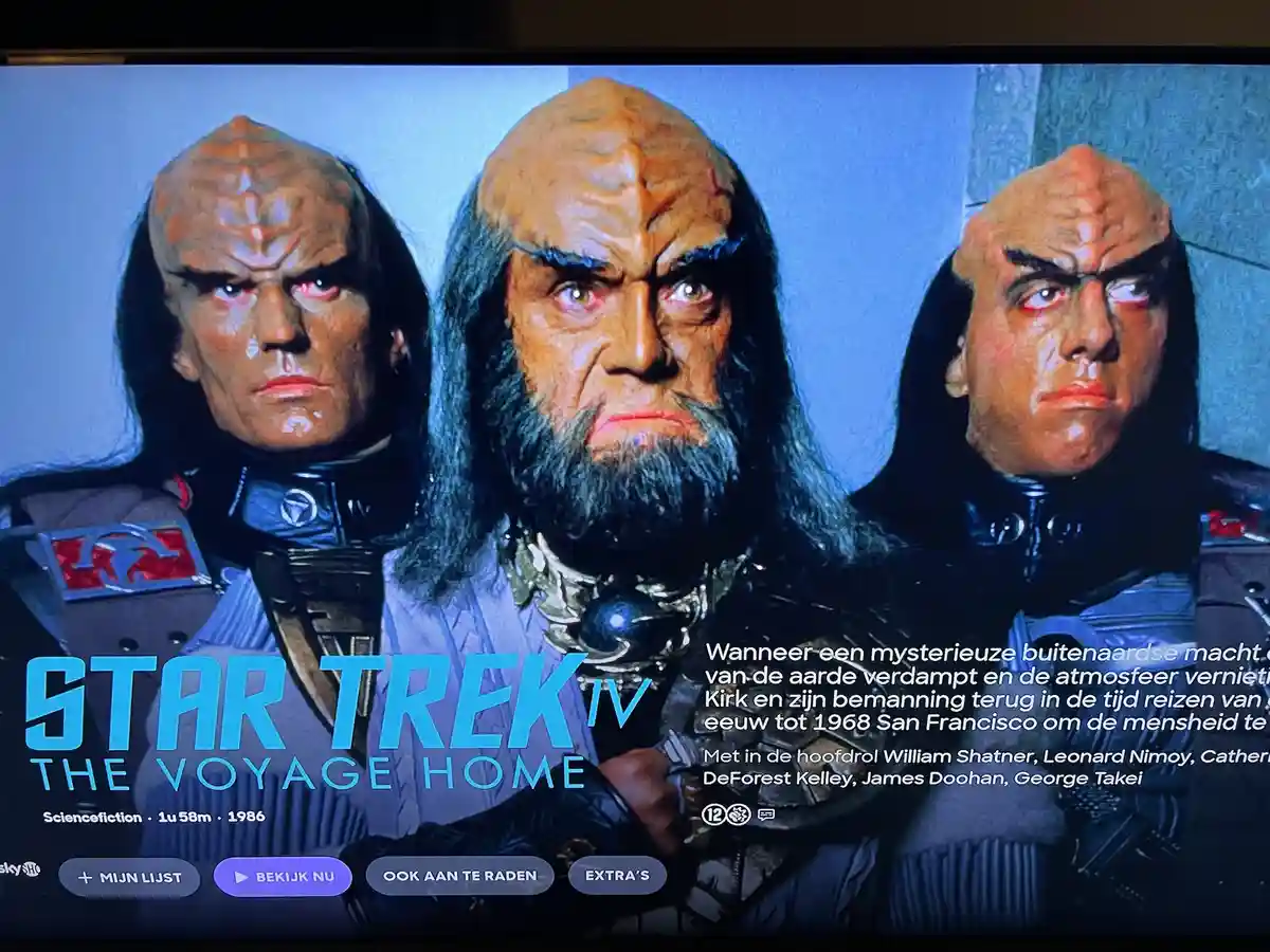 A still from the Star Trek IV: The Voyage Home movie poster featuring three angry Klingon characters. The image is overlaid…