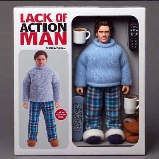 A toy action figure packaged in a box labeled 'LACK OF ACTION MAN British Edition', showing a man in a fuzzy blue sweater…