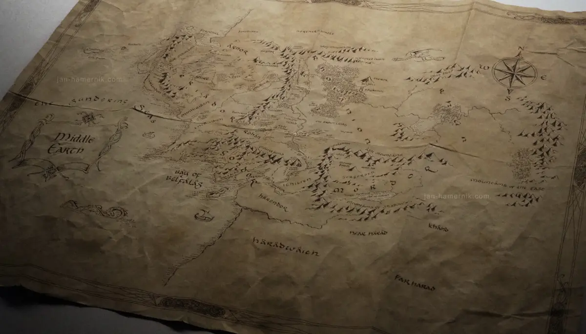 A detailed, hand-drawn fantasy map of Middle Earth on aged parchment, showing regions like Rohan, Gondor, Mordor, and the…