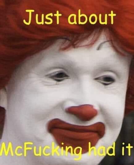 A close-up image of Ronald McDonald with a strained, grimacing expression, overlaid with yellow text reading 'Just about' at…