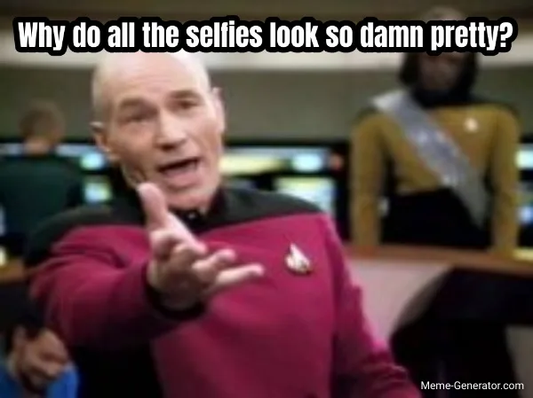 A man in a red Starfleet uniform from Star Trek: The Next Generation, with a surprised and questioning expression, points…