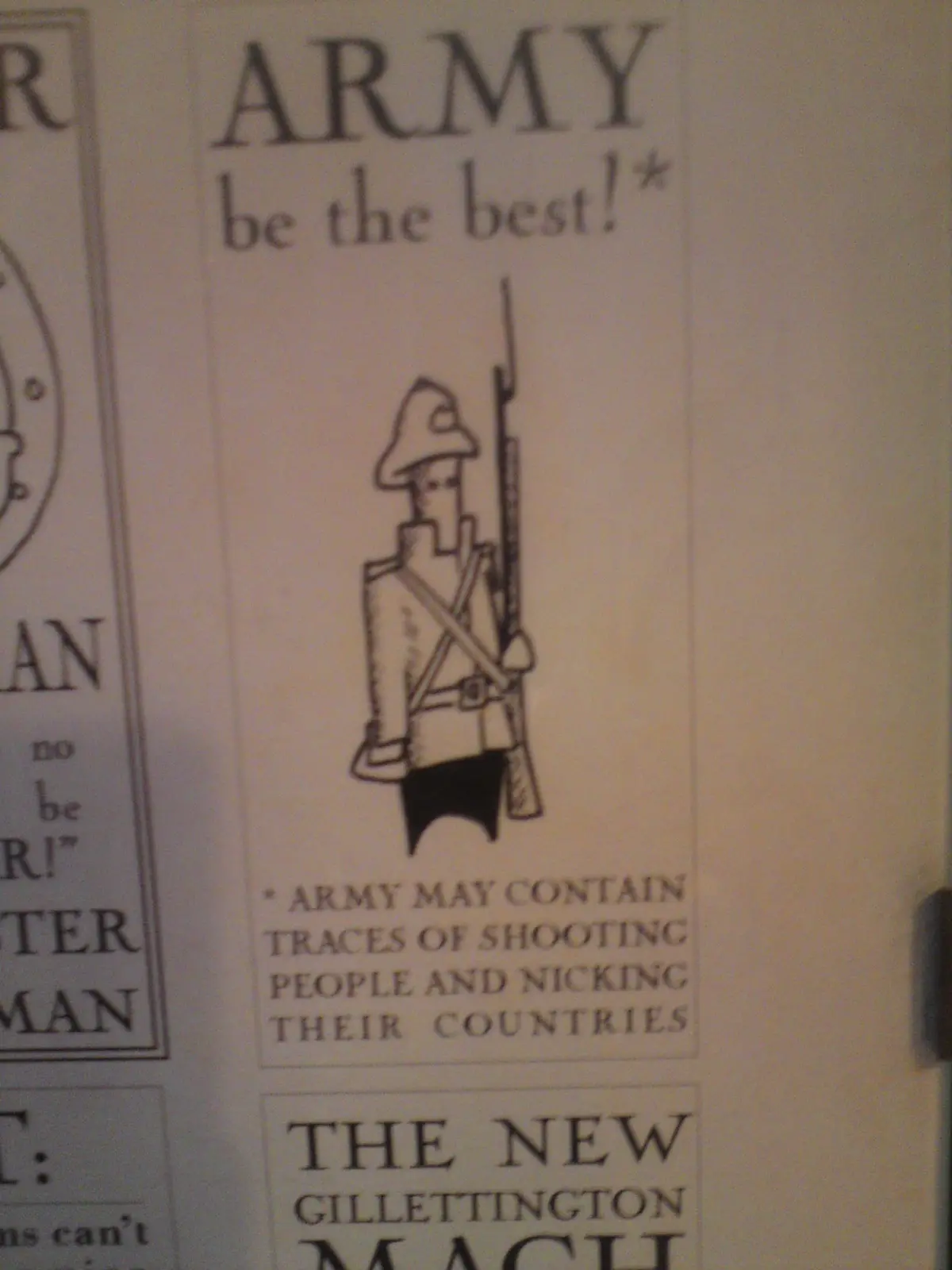 A black-and-white printed poster shows a simple line drawing of a soldier holding a rifle. Above the soldier, the text reads…