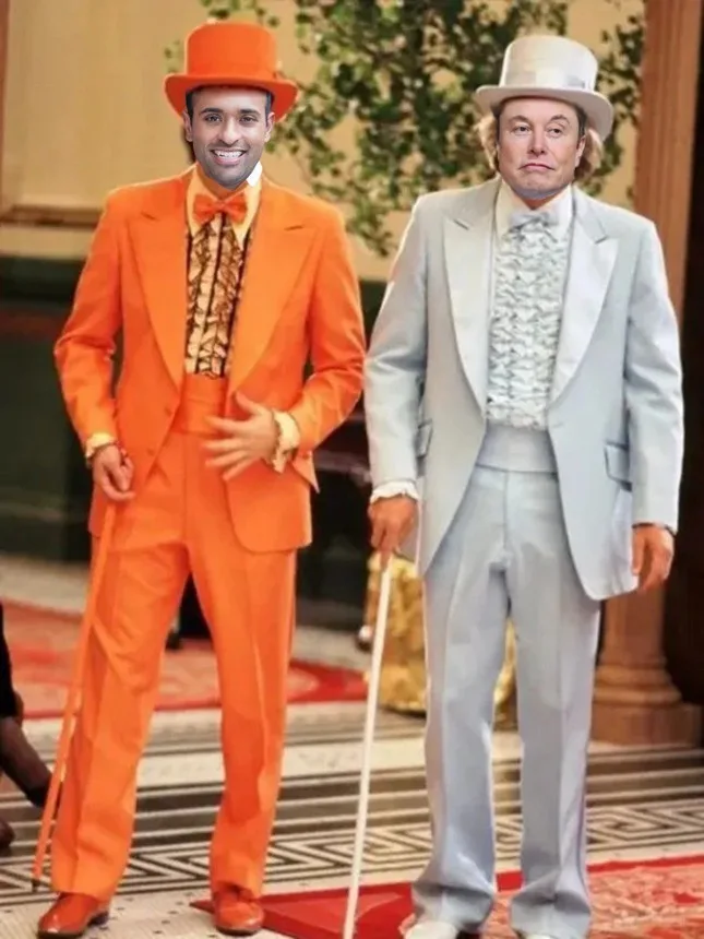 Two men dressed in formal tuxedos stand side by side; one wears a bright orange suit with a matching top hat and bow tie…