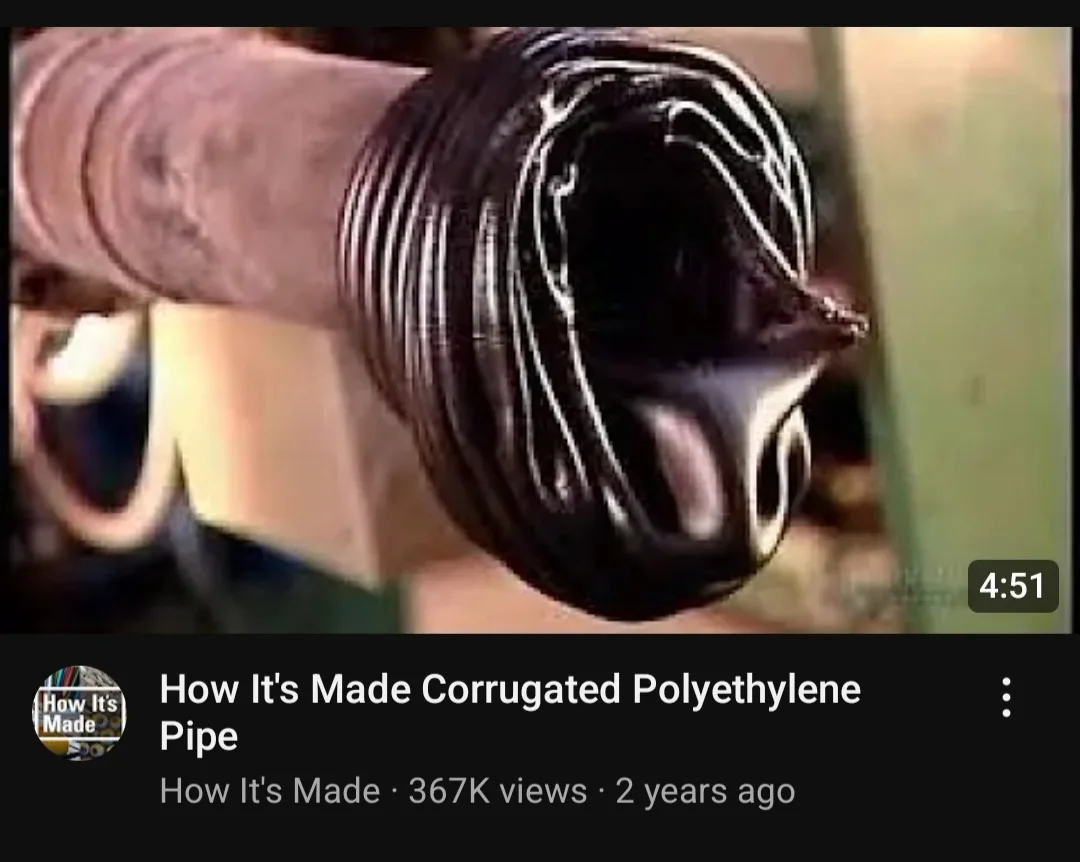 A close-up shot from a 'How It's Made' video shows a large industrial extruder pushing out a black, corrugated polyethylene…